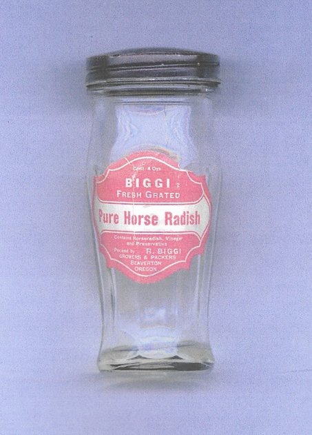 An empty bottle with Rose Biggi's "Pure Horse Radish" label